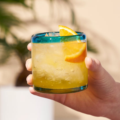 Segunda Vida Primavera short tumbler by Twine Living with blue rim and orange slice on Tampa Home & Garden Store