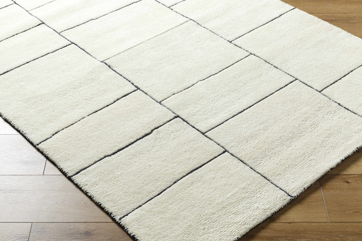 Xylia Ivory Area Rug by Boutique Rugs, ivory shag with black geometric grid pattern on Tampa Home & Garden Store