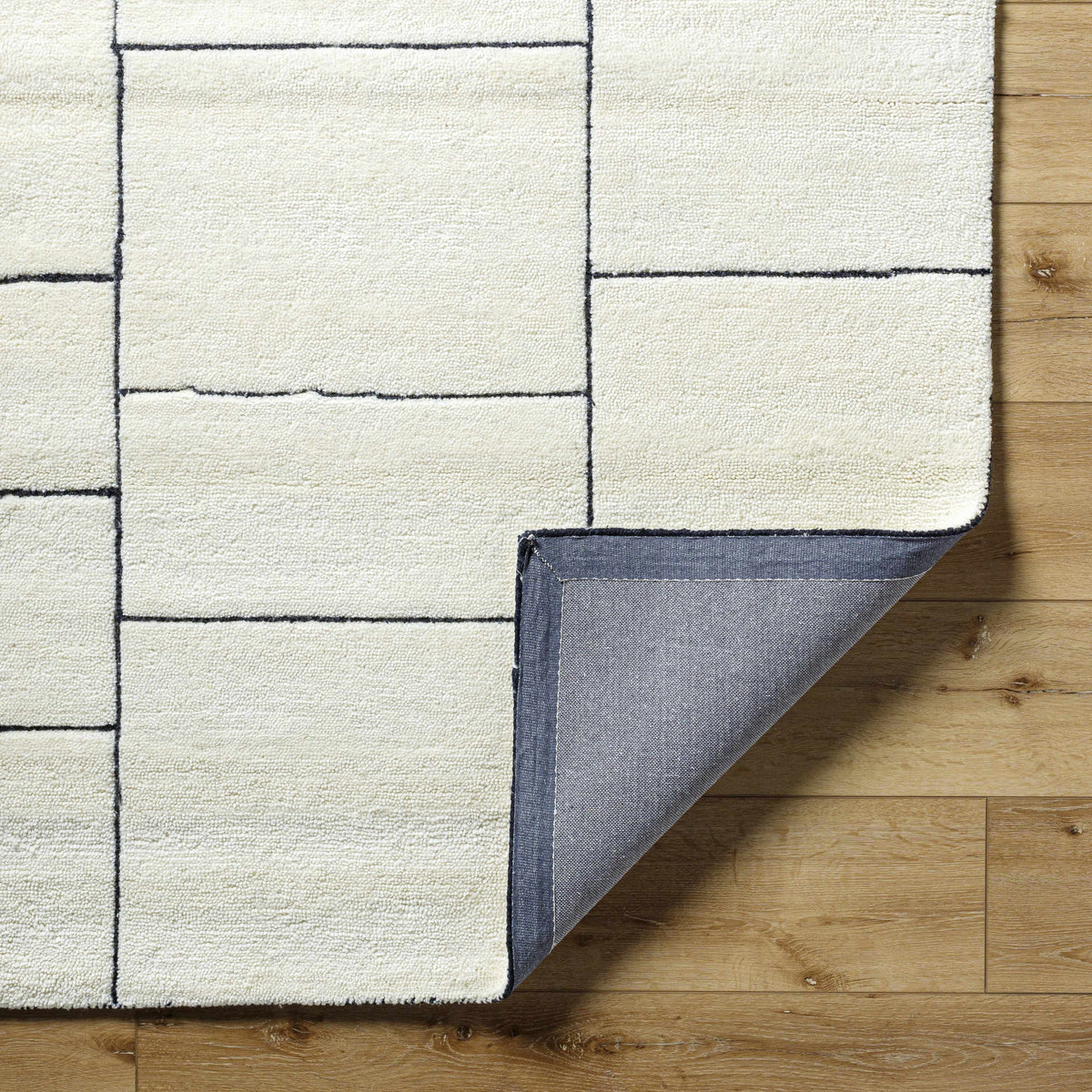 Xylia Ivory Area Rug plush cream pile with black grid lines Boutique Rugs on Tampa Home & Garden Store