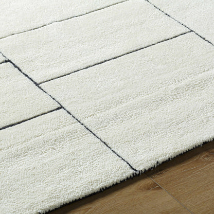 Xylia Ivory Area Rug with black diagonal grid lines Boutique Rugs on Tampa Home & Garden Store