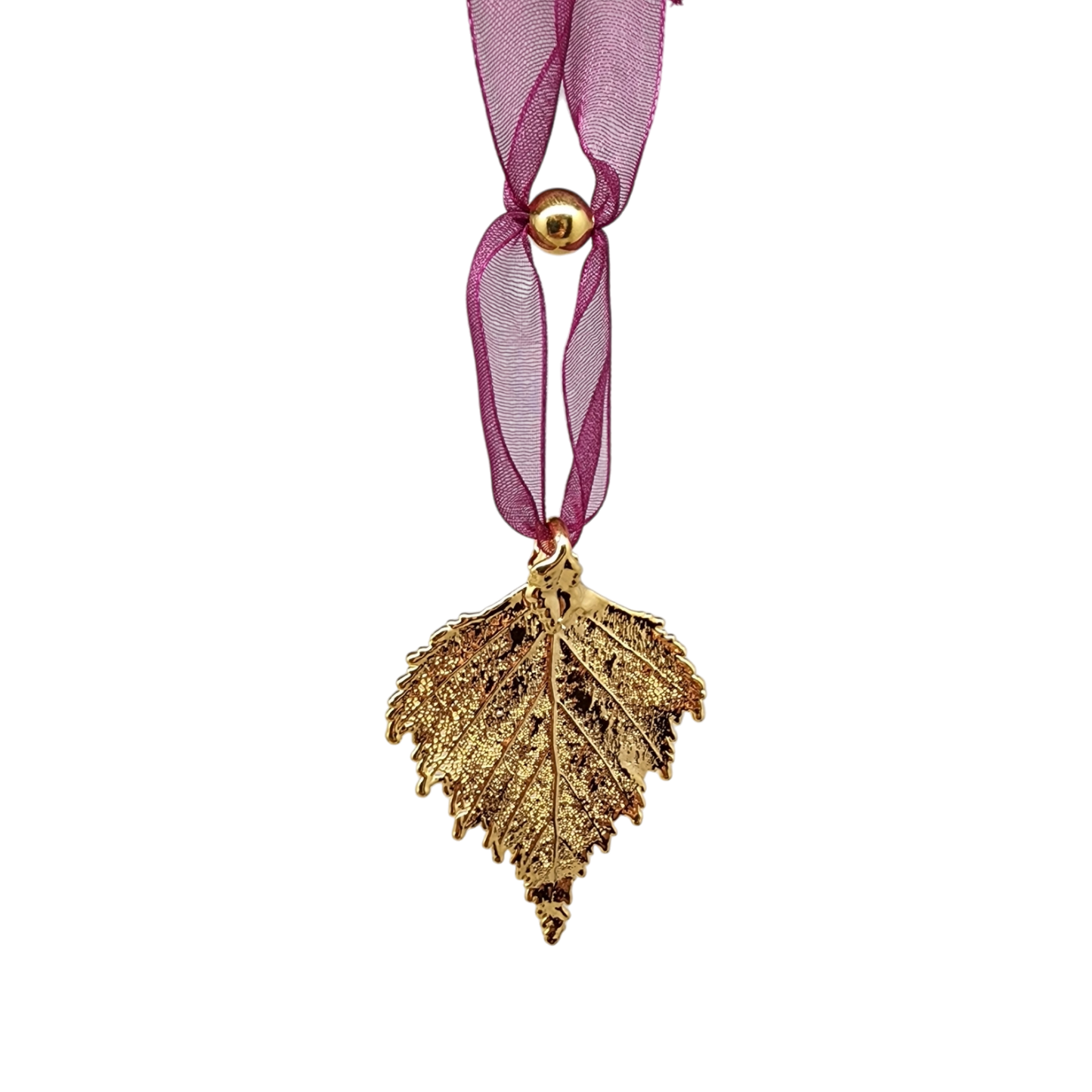 Ornement en feuille de bouleau dorée avec ruban transparent