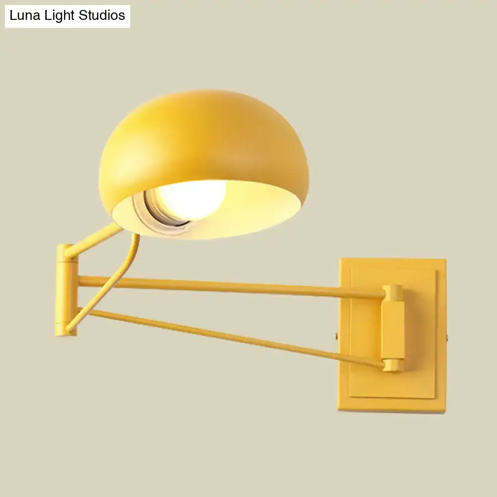 Yellow adjustable metal wall sconce with bowl shade by Decorbites on Tampa Home & Garden Store