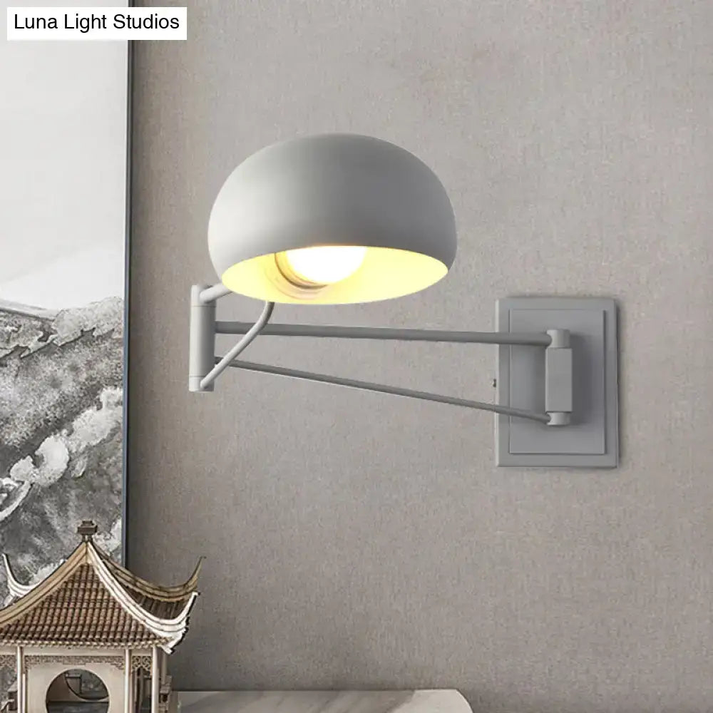 Yellow adjustable metal wall sconce with bowl shade and dual arms by Decorbites on Tampa Home & Garden Store