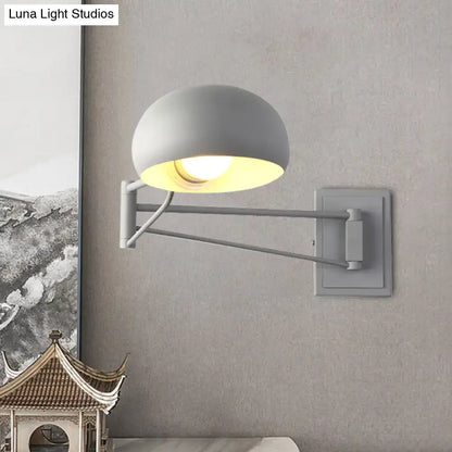 Yellow adjustable metal wall sconce with bowl shade and dual arms by Decorbites on Tampa Home & Garden Store