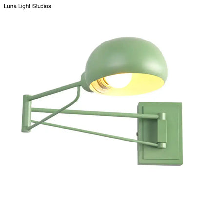 Green adjustable metal wall sconce with bowl shade for bedroom on Tampa Home & Garden Store