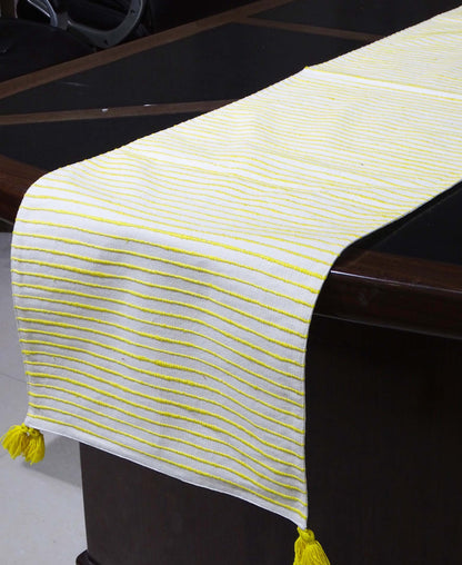 Vibhsa cotton table runner with yellow stripes, 16x90, tassels at ends on dark dining table on Tampa Home & Garden Store