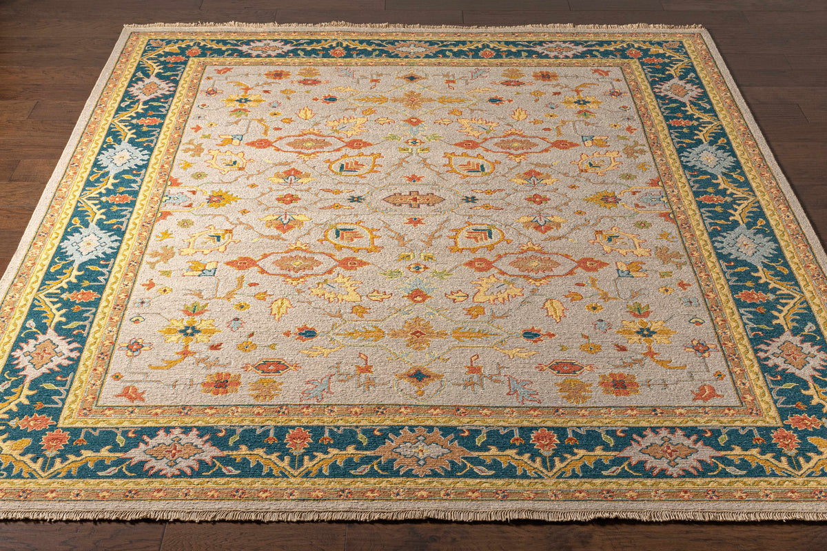 Yenimahalle Premium Rug from Boutique Rugs, beige field with teal border on Tampa Home & Garden Store