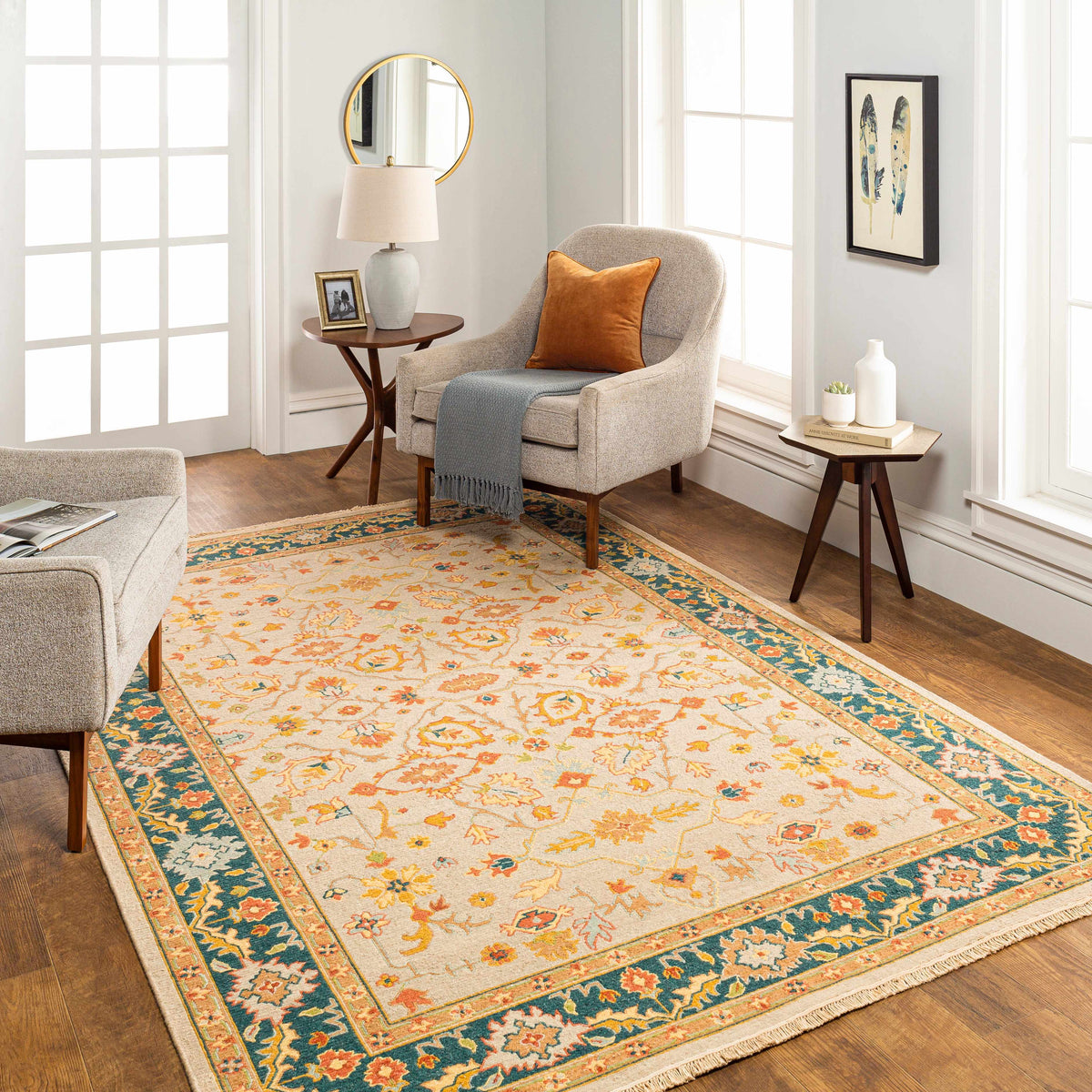 Yenimahalle Premium Rug by Boutique Rugs; cream area rug with teal border floral motif on Tampa Home & Garden Store
