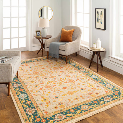 Yenimahalle Premium Rug by Boutique Rugs; cream area rug with teal border floral motif on Tampa Home & Garden Store