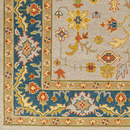 Yenimahalle Premium Rug by Boutique Rugs beige field with blue border and floral motifs on Tampa Home & Garden Store