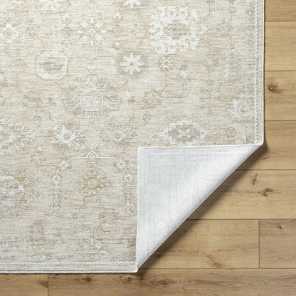 Yonca Luxe Rug by Boutique Rugs, beige patterned clearance rug on wood floor on Tampa Home & Garden Store