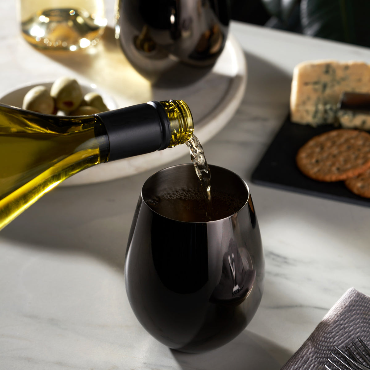 Viski gunmetal stainless steel stemless wine glasses, set of 2, wine being poured on Tampa Home & Garden Store