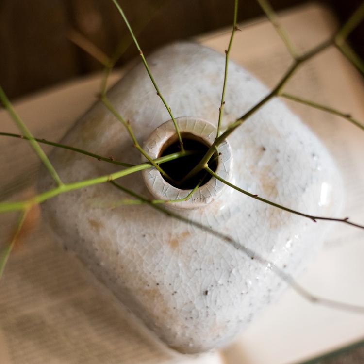 Zen Style Ceramic Vase by RusticReach with cream crackle glaze and green stems on Tampa Home & Garden Store