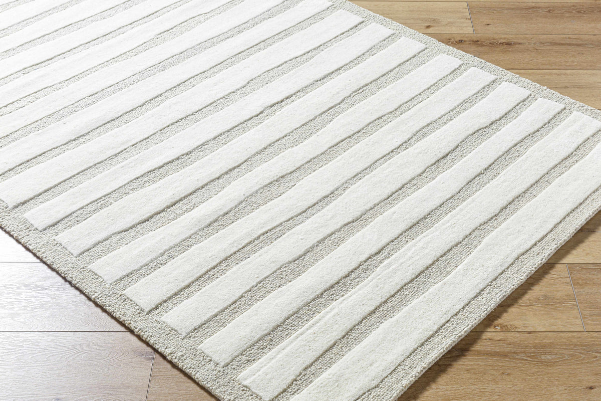 Zerah Area Rug - Clearance by Boutique Rugs, cream striped rug on wood floor on Tampa Home & Garden Store