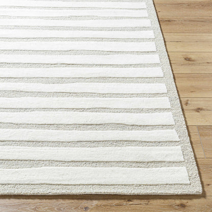 Zerah Area Rug by Boutique Rugs, beige and white striped rug on wood floor on Tampa Home & Garden Store