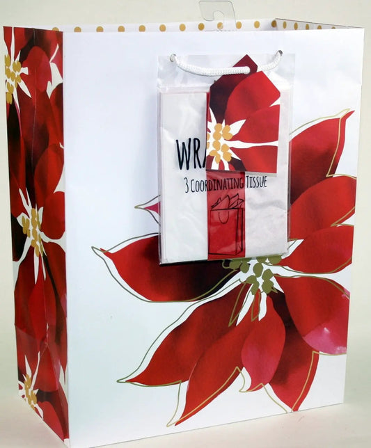 Large poinsettia gift bag with matching tissue, white bag with red floral design, handles on Tampa Home & Garden Store