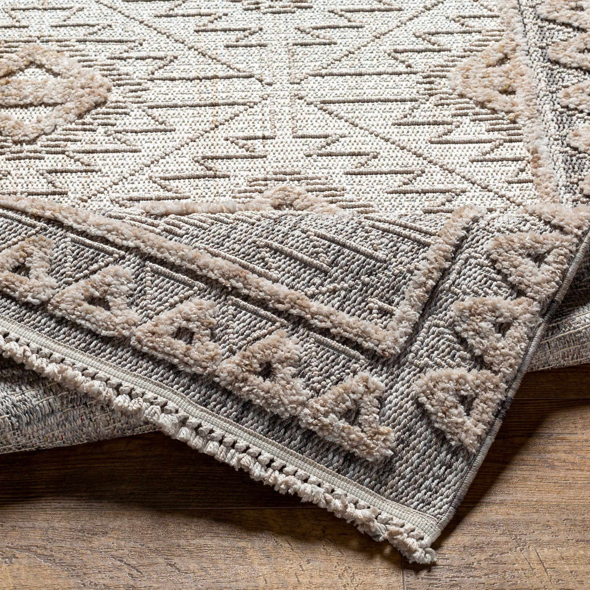 Agoo High-Low Pile Rustic Rug beige taupe textured pile with fringe by Boutique Rugs on Tampa Home & Garden Store