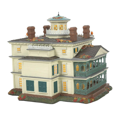 Haunted Mansion ceramic jack lantern ornament ivory holiday village house with teal shutters on Tampa Home & Garden Store