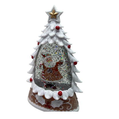 Lighted Gingerbread Santa Water Globe featuring a frosted white tree, gold star, red accents on Tampa Home & Garden Store