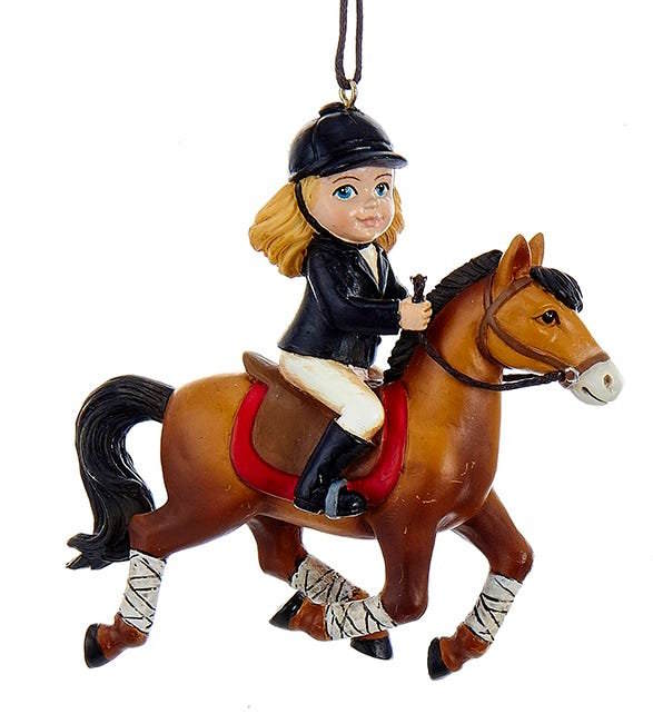 Adorno de niña montando a caballo -