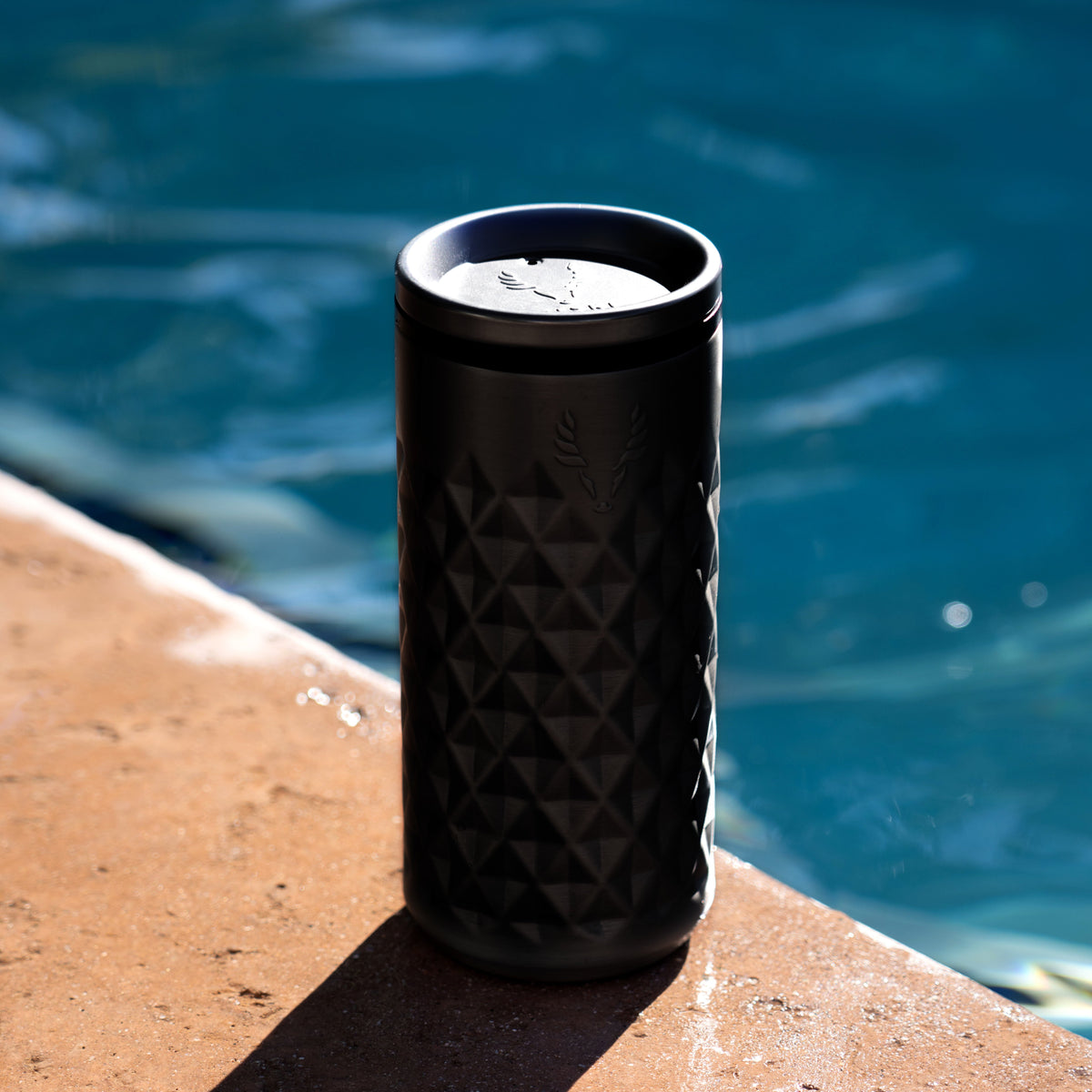 Paragon stainless steel highball tumbler in obsidian with a faceted diamond pattern on Tampa Home & Garden Store
