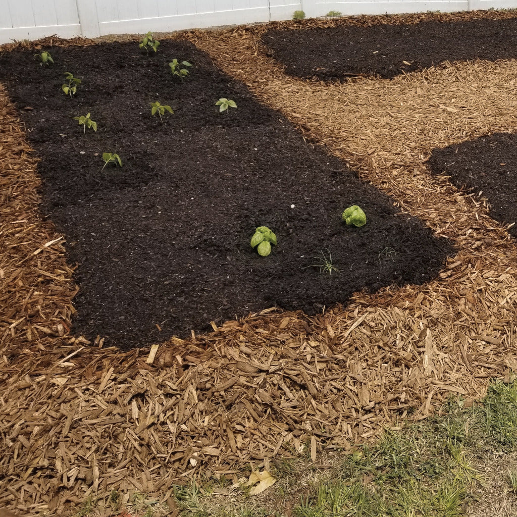 Bulk organic mulch delivered and used for gardening and landscape beds.